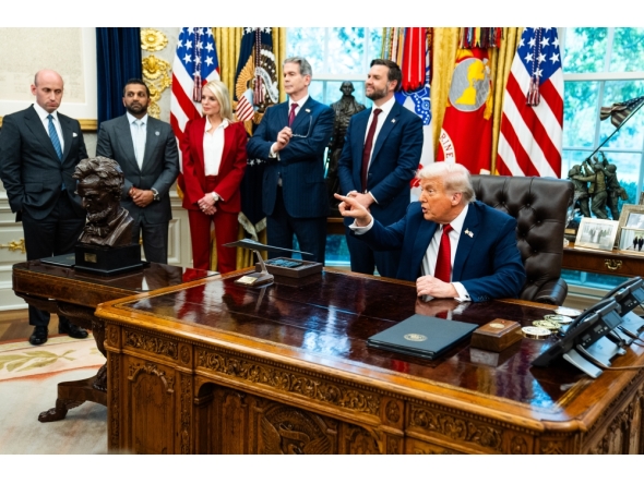 US President Donald Trump speaks with the press during the signing of executive orders in the Oval Office, in Washington DC, on September 25, 2025. (Photo by Demetrius Freeman/The Washington Post)