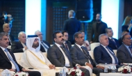 Qatari, Iraqi officials and other participants during the forum.