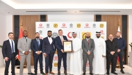 Vodafone Qatar and Intertek Global International officials at the award ceremony.