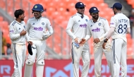 India's players celebrate their win in the first Test cricket match against West Indies at the Narendra Modi Stadium in Ahmedabad on October 4, 2025. (Photo by R.Satish Babu / AFP) 