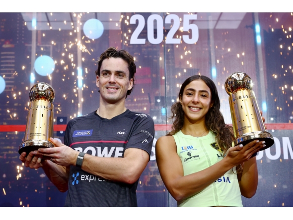 New Zealand’s Paul Coll and Egypt’s Hania El Hammamy celebrate with their trophies.