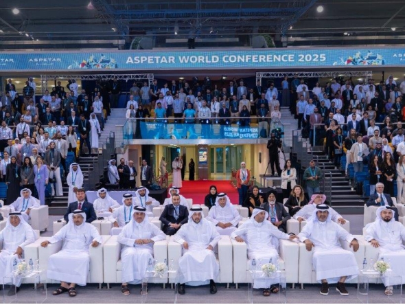 Minister of Public Health H E Mansour bin Ibrahim bin Saad Al Mahmoud (centre)  and other officials at the opening session of the conference yesterday.  