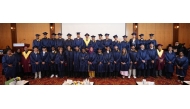  Students and school officials at the ceremony.