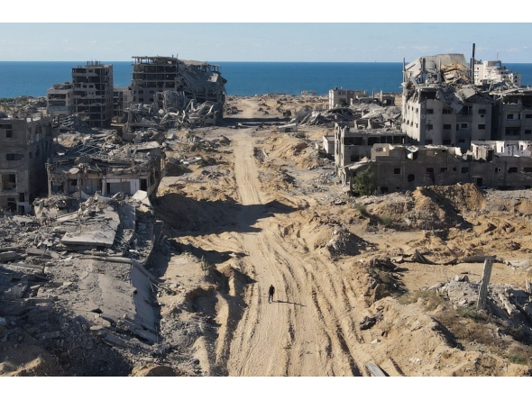 An aerial view shows the Al-Maqussi Towers district, heavily damaged by massive Israeli bombardment over the past two years, in northwestern Gaza City on October 15, 2025 (Photo by AFP)
