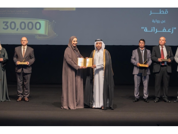 General Manager of the Cultural Village Foundation - Katara Prof. Dr. Khalid bin Ibrahim Al-Sulaiti honouring a winner of the 11th Katara Prize for Arabic Novel 2025 at a ceremony at the Katara Opera House yesterday.