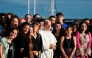 Pope Leo XIV poses with the crew of the Peace training ship 