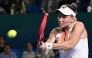 Kazakhstan's Elena Rybakina hits a return to Italy's Jasmine Paolini during their women's singles semi-final match at the WTA Ningbo Open tennis tournamen in Ningbo, in China痴 eastern Zhejiang province on October 18, 2025. (Photo by AFP)