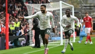 Chelsea's English defender Reece James celebrates scoring the team's third goal during the English Premier League football match between Nottingham Forest and Chelsea at The City Ground in Nottingham, central England, on October 18, 2025. (Photo by JUSTIN TALLIS / AFP) 