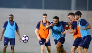 Al Duhail players attend a training session to prepare for their match against Al Wahda FC.  