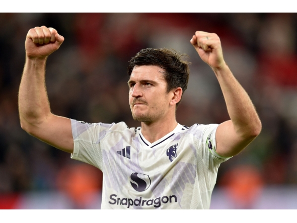 Manchester United's English defender #05 Harry Maguire reacts after the English Premier League football match between Liverpool and Manchester United at Anfield in Liverpool, north west England on October 19, 2025. (Photo by PETER POWELL / AFP) 