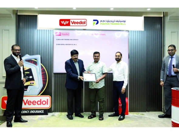 Veedol International and Positive Trading officials during the meeting.