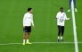 Paris Saint-Germain’s Ousmane Dembele (right) and Marquinhos attend a training session