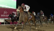 Grace Secret storms ahead under jockey Alberto Sanna. Photo: Juhaim/QREC 