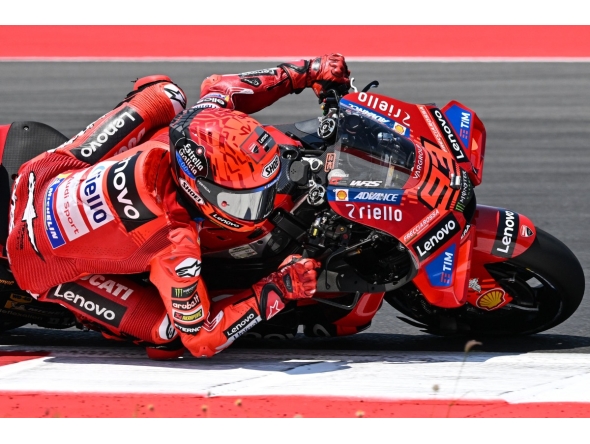 Ducati Lenovo Team's Spanish MotoGP rider Marc Marquez rides during the warm-up ahead of the MotoGP Indonesian Grand Prix at the Mandalika International Circuit in Mandalika, West Nusa Tenggara on October 5, 2025. (Photo by SONNY TUMBELAKA / AFP)

