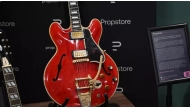 The cherry-red Gibson ES-355 guitar is famous for having been damaged during a fight that led to the Oasis band breaking up in August 2009. (Justin Tallis / AFP)