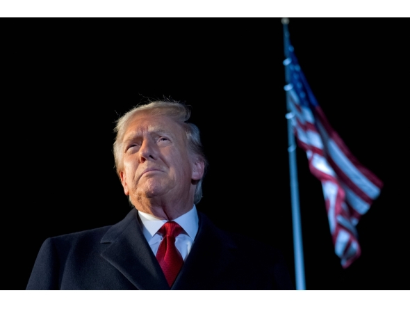 US President Donald Trump speaks to the media as he walks to Marine One prior to departure from the South Lawn of the White House in Washington, DC, October 24, 2025. (Photo by Saul Loeb / AFP)