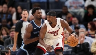  Bam Adebayo #13 of the Miami Heat handles the ball against Jaren Jackson Jr. #8 of the Memphis Grizzlies during the second half at FedExForum on October 24, 2025 in Memphis, Tennessee. Justin Ford/Getty Images/AFP 
