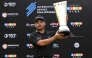 Philippines' Miguel Tabuena holds up the trophy after winning the International Series Philippines golf tournament at Sta. Elena Golf Club in Santa Rosa, Laguna province on October 26, 2025. (Photos by Ted Aljibe / AFP)