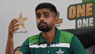 (FILES) Pakistan's cricket team captain Babar Azam speaks during a press conference at the Gaddafi Stadium in Lahore on September 26, 2023. (Photo by Arif Ali / AFP)
