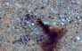 (FILES) This handout image courtesy of Maxar Technologies taken on April 16, 2025 and released on April 17, 2025, shows fire and smoke at Zamzam camp near the besieged Darfur city of El-Fasher. (Photo by Satellite image 2025 Maxar Technologies / AFP)