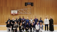 Participants of the workshop with Olympic medallist Ibtihaj Muhammad.