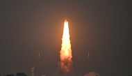An Indian Space Research Organisation (ISRO) rocket LVM3-M5, carrying the CMS-03 communication satellite, blasts off from the Satish Dhawan Space Centre in Sriharikota, an island off the coast of Andhra Pradesh state on November 2, 2025. (Photo by R. Satish BABU / AFP)
