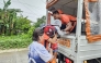 The Philippine Coast Guard personnel assisting in evacuating residents in Guiuan town, ahead of the landfall of Typhoon Kalmaegi. Photo by handout / Philippine Coast Guard station / AFP 