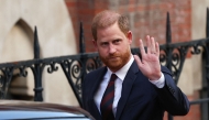 Britain's Prince Harry, Duke of Sussex waves as he departs the the Royal Courts of Justice, Britain's High Court, in central London, on April 9. Photo by HENRY NICHOLLS / AFP