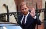 Britain's Prince Harry, Duke of Sussex waves as he departs the the Royal Courts of Justice, Britain's High Court, in central London, on April 9. Photo by HENRY NICHOLLS / AFP