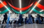 Travelers wait in line at a security checkpoint at O'Hare International Airport in Chicago, Illinois on November 7 2025. (Photo by Kamil Krzaczynski / AFP)