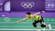 (Files) Taiwan's Tai Tzu-ying plays a shot to Belgium's Lianne Tan in the women's singles badminton group stage match during the Paris 2024 Olympic Games in July 2024. (Photo by David Gray / AFP)