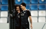 Al Sadd's Akram Afif (left) and Roberto Firmino celebrate.
