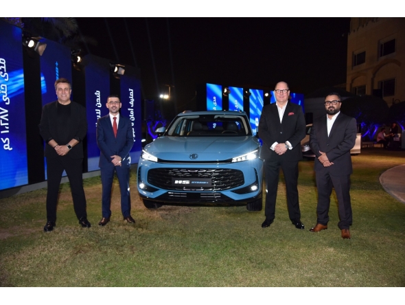 Officials pose for a group photo during the launch ceremony.
