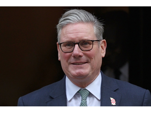 Britain's Prime Minister Keir Starmer leaves 10 Downing Street in central London on November 12, 2025, to take part in the weekly session of Prime Minister's Questions (PMQs). (Photo by Adrian Dennis / AFP)