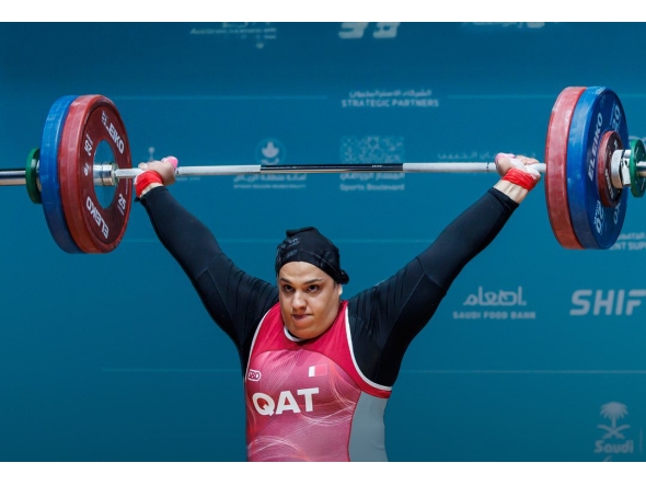 Ouisal Ikhlef competes during the Women’s +86kg weightlifting final.