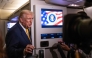 US President Donald Trump speaks to members of press aboard Air Force One on November 14, 2025 while in flight from Washington, DC to West Palm Beach International Airport. Roberto Schmidt/Getty Images/AFP 