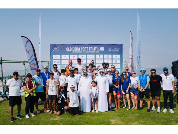 Participants receiving awards at the Qatar Triathlon League for the 2025/2026 that took place at Old Doha Port