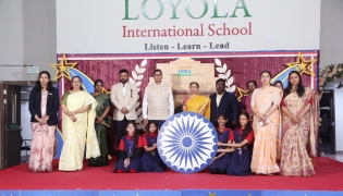 School principal and guests with the winning students and teachers.  