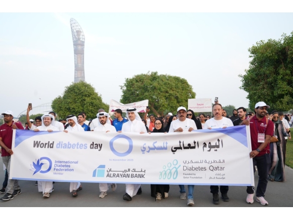 Representatives and participants walking around Aspire park to mark World Diabetes Day.