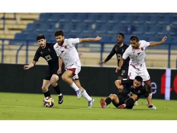 Action during the match between Al Markhiya and Lusail yesterday. 