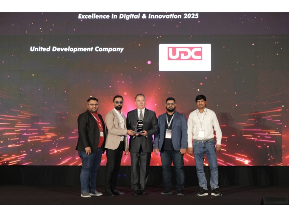 UDC officials receiving the award during the event.