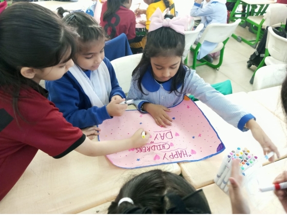 PISQ KG and Primary Wings students during celebrations.