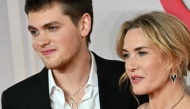British actress Kate Winslet and her son US-English actor and writer Joe Anders pose on the red carpet upon arrival to attend the world premiere of the film 