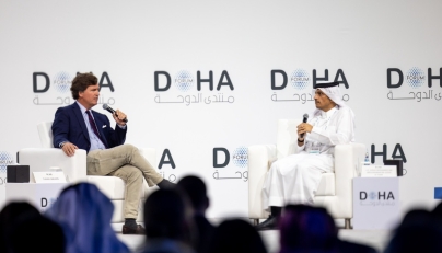 Prime Minister and Minister of Foreign Affairs H E Sheikh Mohammed bin Abdulrahman bin Jassim Al-Thani in discussion with Tucker Carlson at the Doha Forum yesterday.