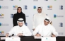 Qatar Museums Chairperson H E Sheikha Al Mayassa bint Hamad bin Khalifa Al Thani, Dukhan Bank Executive Board Member and Managing Director H E Sheikh Mohammed bin Hamad bin Jassim Al-Thani, and other officials at the signing ceremony. 
