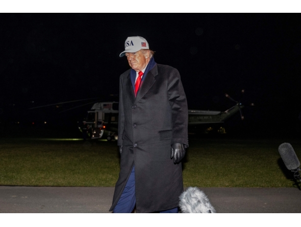 US President Donald Trump walks to the White House residence after speaking to the press on the South Lawn of the White House in Washington, DC, on December 13, 2025. (Photo by Daniel Heuer / AFP)