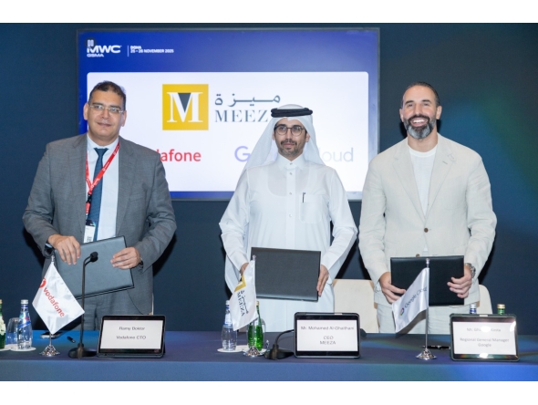 Officials pose for a group photo during the agreement signing.