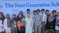 Pakistan Embassy and TNG officials with students during the visit.