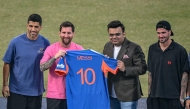 Argentina's footballers Lionel Messi (2L), Rodrigo De Paul (R) and Uruguayan footballer Luis Suلrez (L) pose for a photograph with International Cricket Council (ICC) chairman Jay Shah during his GOAT Tour at the Arun Jaitley Stadium in New Delhi on December 15, 2025. (Photo by Sajjad HUSSAIN / AFP)
