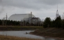 This photograph shows the containment vessel of the New Safe Confinement (NSC) which contains radiation from the remains of reactor 4 of the former Chernobyl Nuclear Power Plant, in Chernobyl, on December 22, 2025, amid the Russian invasion of Ukraine. Photo by Tetiana Dzhafarova / AFP
